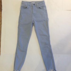 Subdued high rise skinny pinstripe jeans